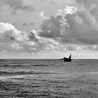 Dead in the water, the abandoned USS Hornet shortly before it was sunk.